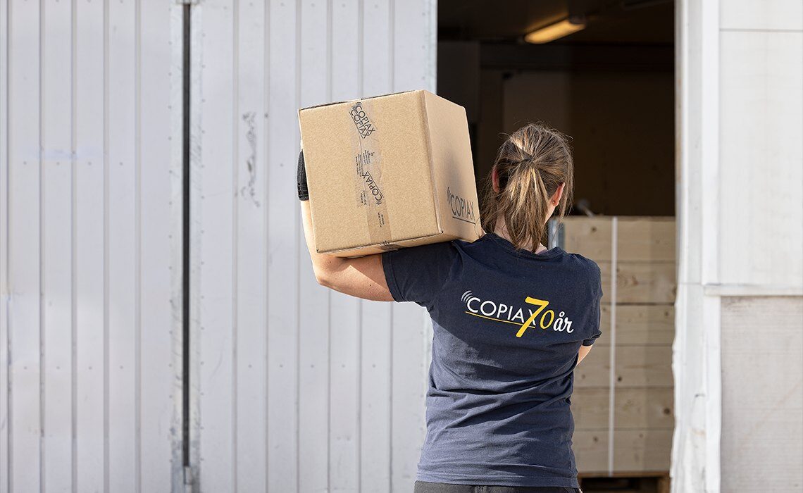 copiax-case-study-girl-carrying-box